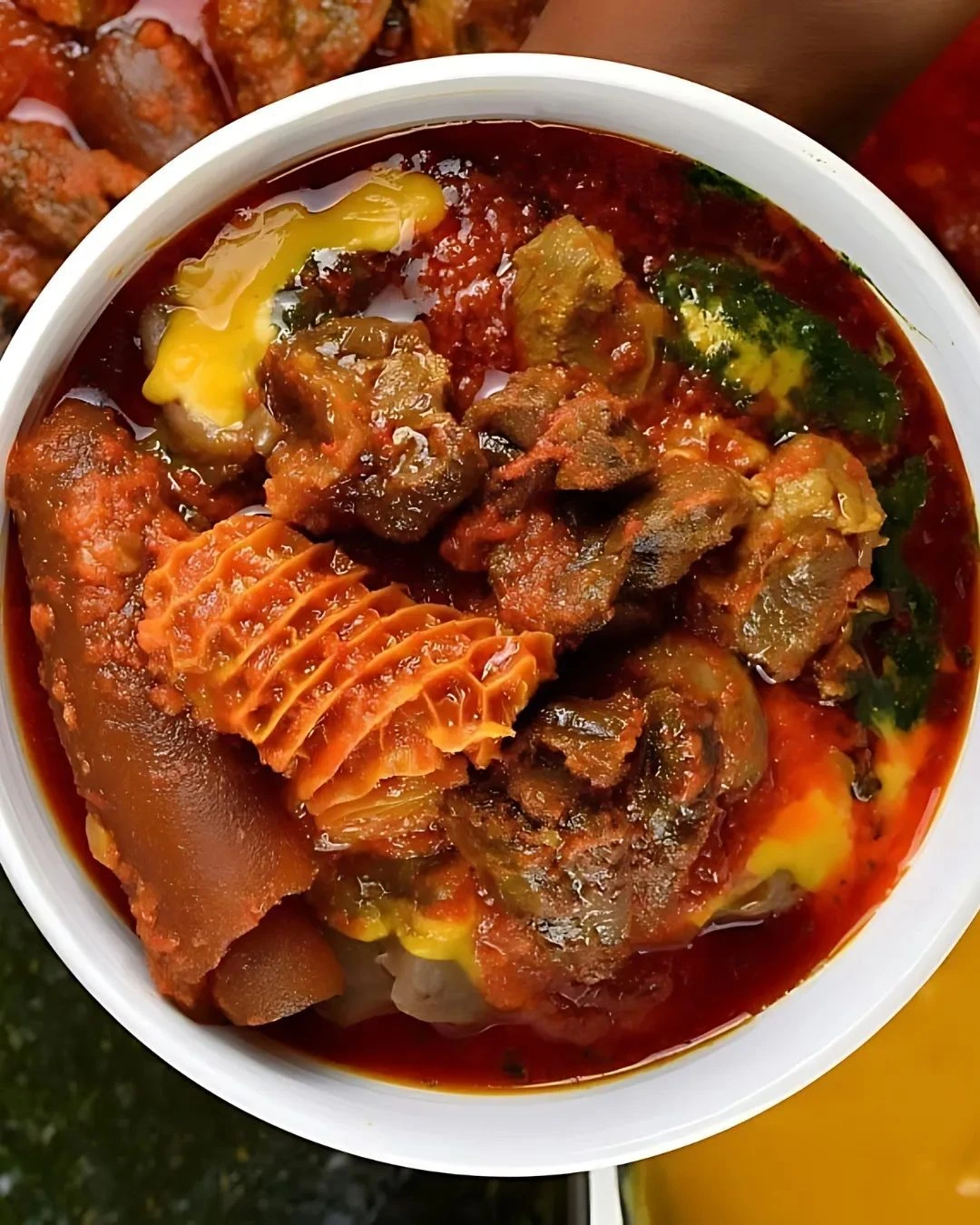 Assorted meat and tripe in a rich red stew